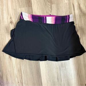 LULULEMON ATHLETICA PACE SETTER SKIRT SIZE 10 BLACK/asst stripe/bleached coral